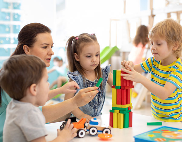 Children using building blocks