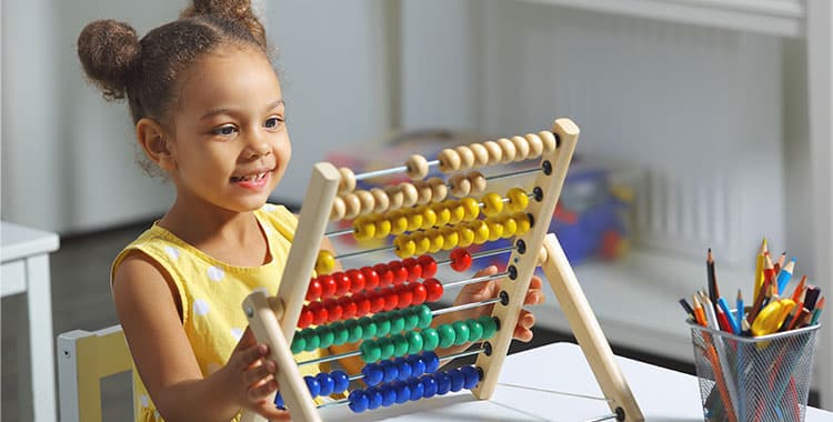 Child using an abacus